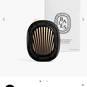 Opened Diptyque Baies car diffuser